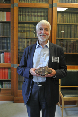 Prof Paul Henderson holds the Society's meteorite